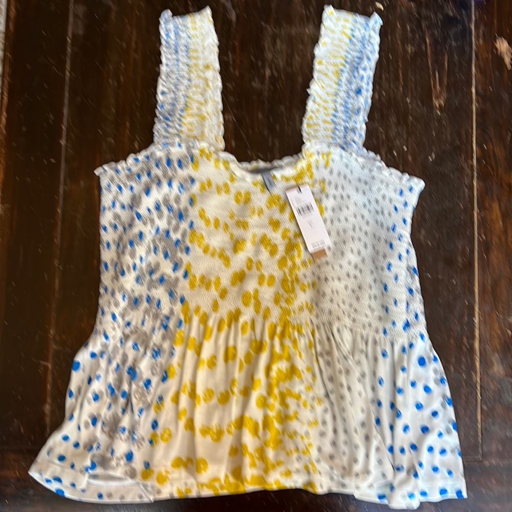 Conditions Apply from Anthropologie tank top.
